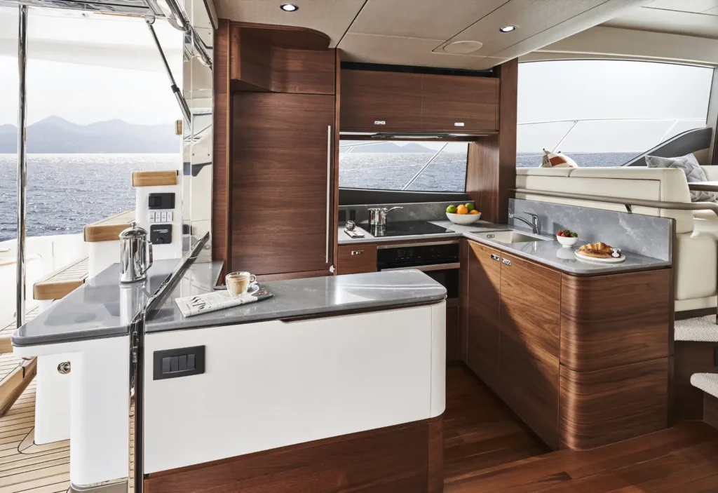f55-interior-galley-walnut-satin-2022