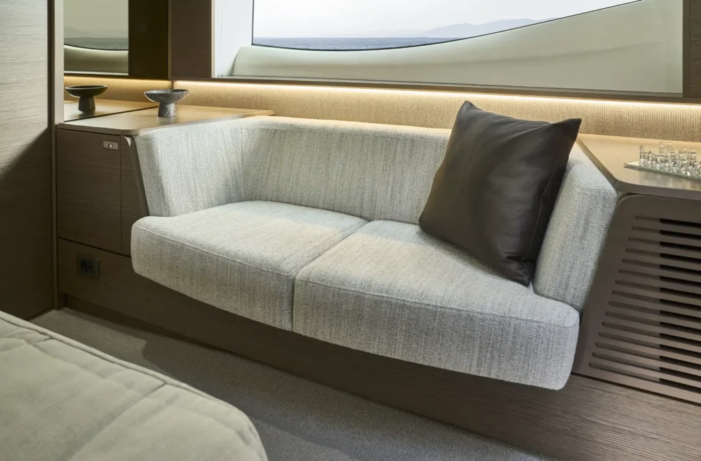 f58-interior-owners-stateroom-sofa-silver-oak