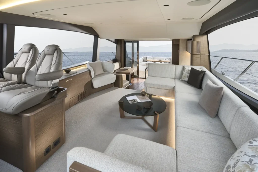 f58-interior-saloon-looking-aft-with-optional-chair-table-closed-silver-oak