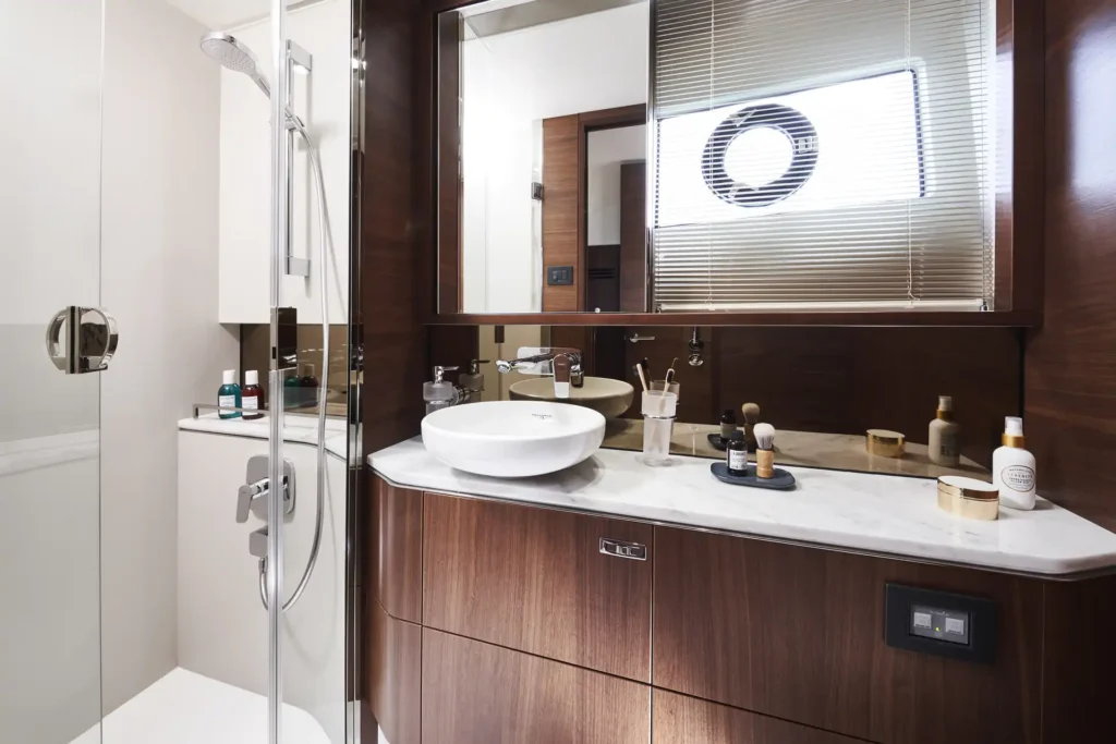 s62-interior-owners-stateroom-bathroom-walnut-satin