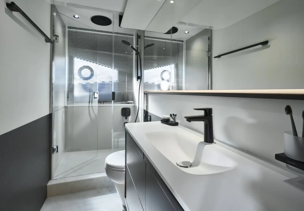 s65-interior-owners-stateroom-bathroom-silver-oak-satin