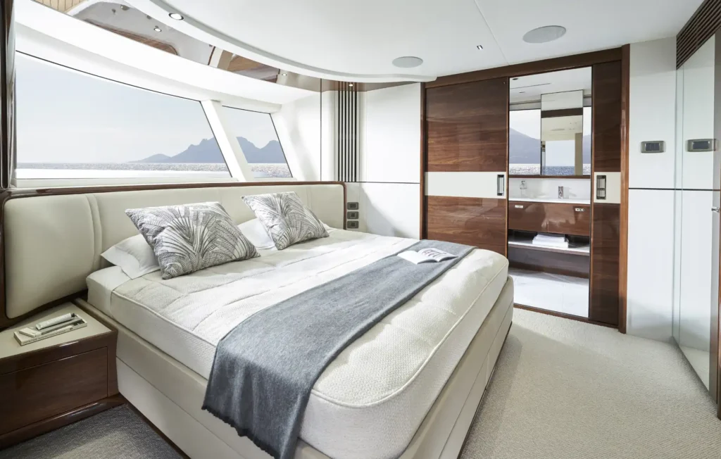 x80-interior-main-deck-owners-stateroom-en-suite-doors-partially-open